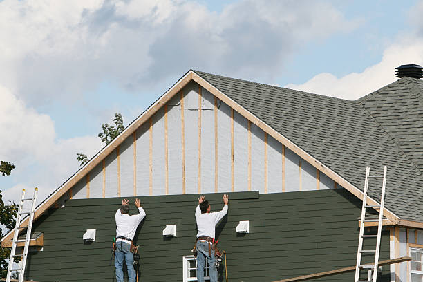 Professional Emergency Siding Repair technician working in Cocolamus, PA